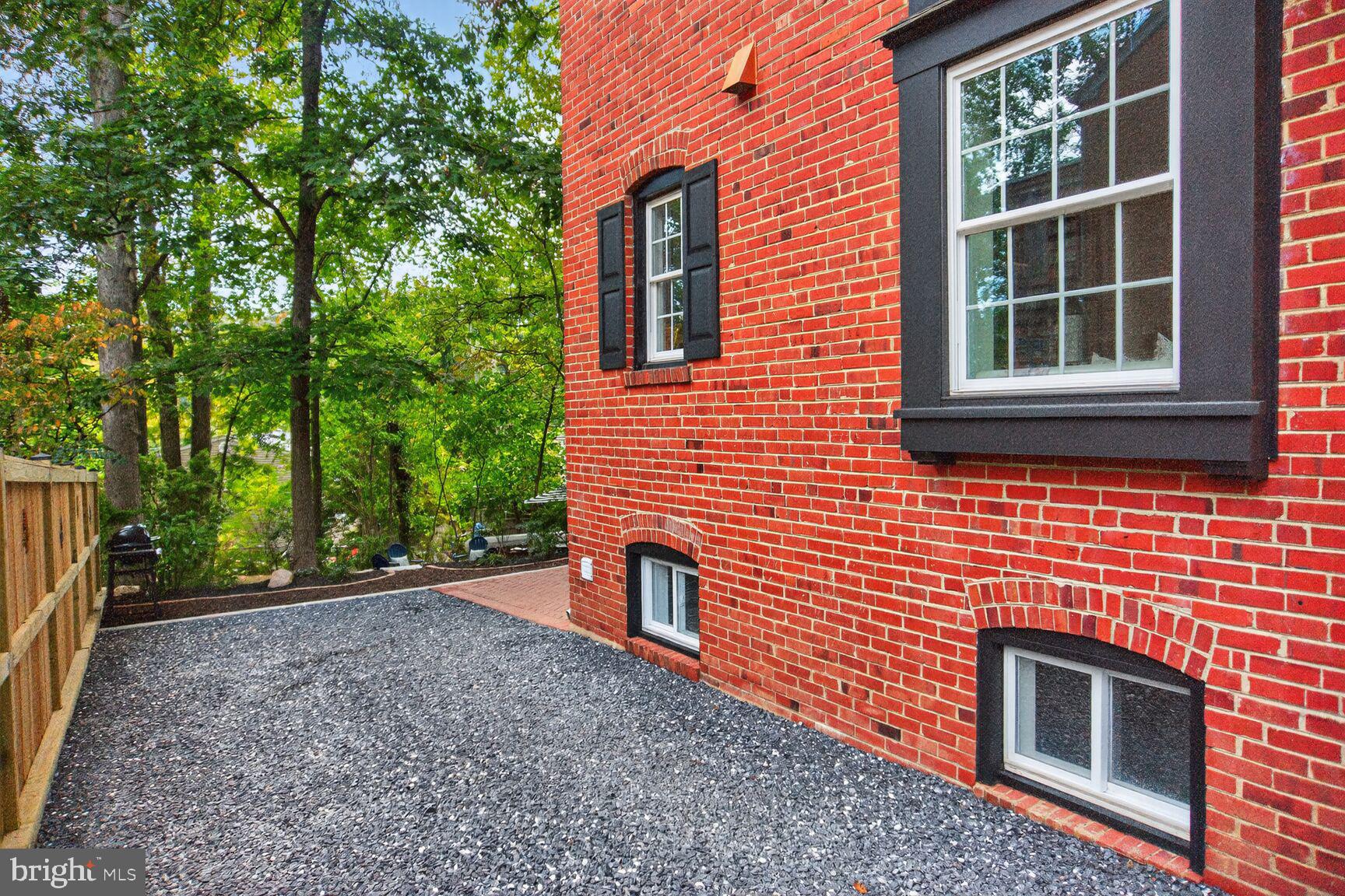 302 Penwood Road Silver Spring, MD 20901 - Photo 5 of 44 a backyard of a house with seating space