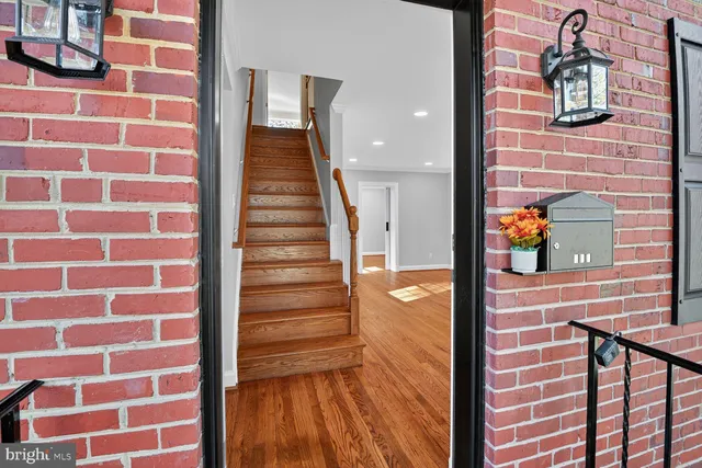 a view of a brick building with wooden floor