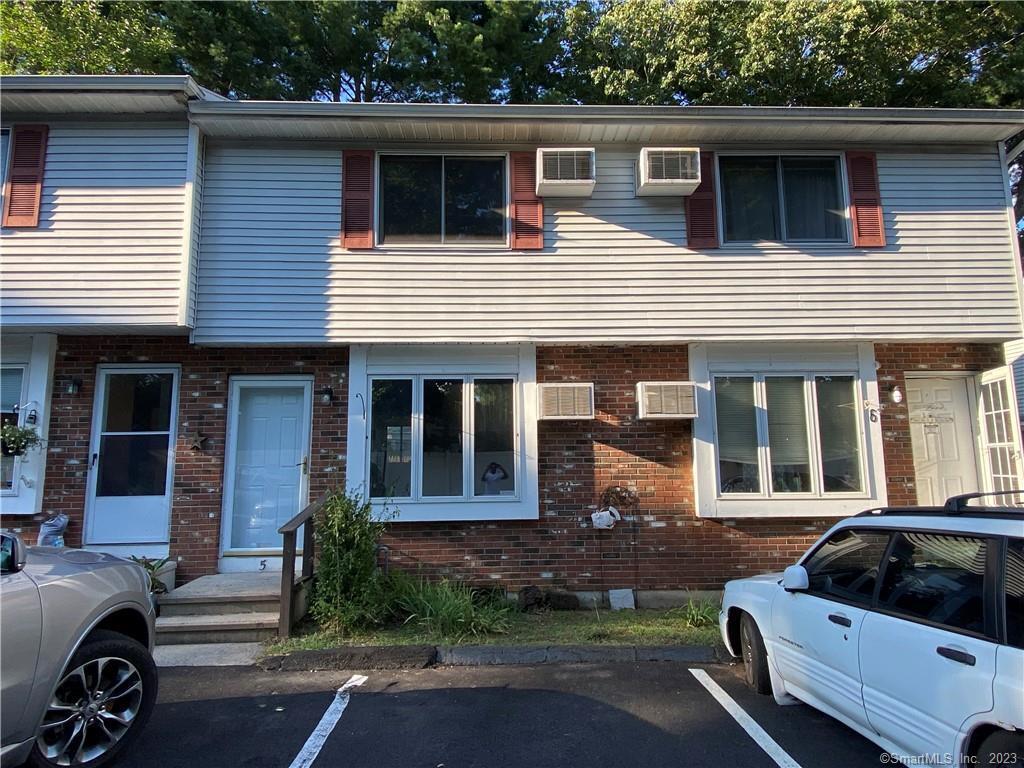 63 Webb Street, Unit 5 Meriden, CT 06451 - Photo 1 of 1 a view of a car parked in front of a house