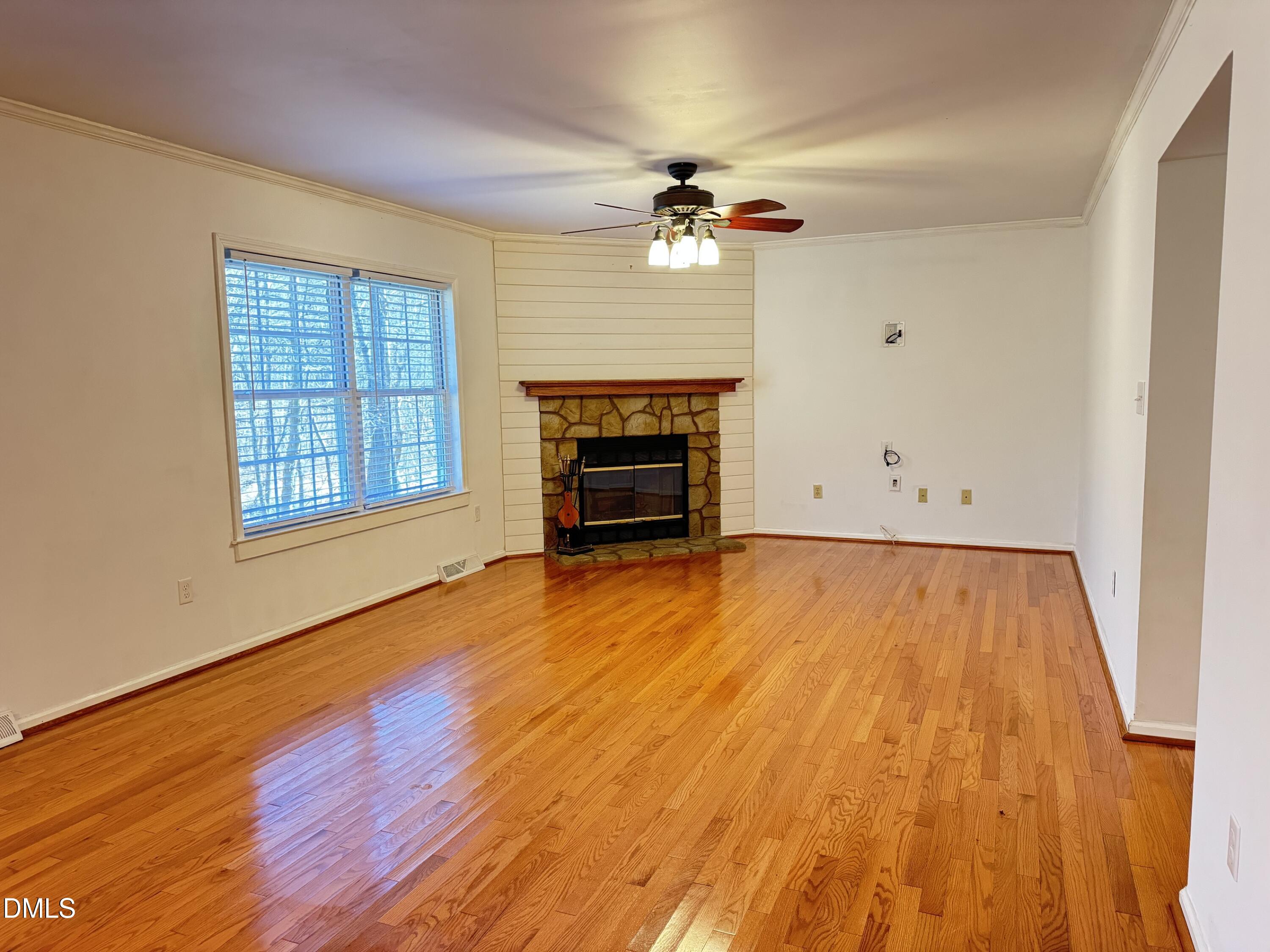 4632 Culbreth Road Oxford, NC 27565 - Photo 13 of 20 wooden floor in an empty room with a window