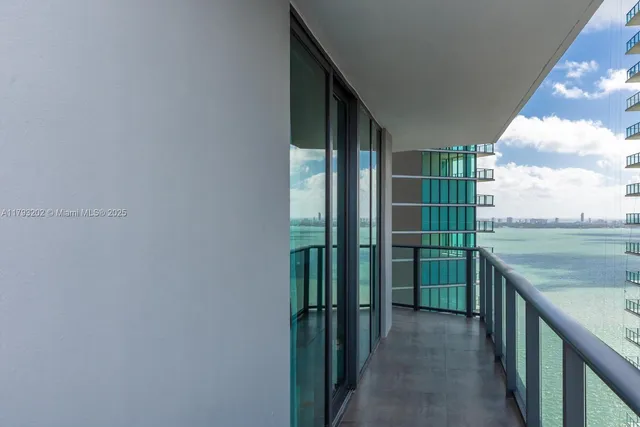 a work room with furniture and a window