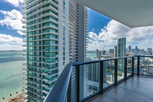 a bathroom with a bathtub and a sink