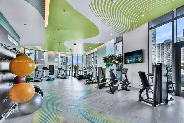 a view of a balcony with wooden floor