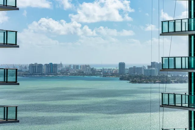 a view of a lake with a big yard