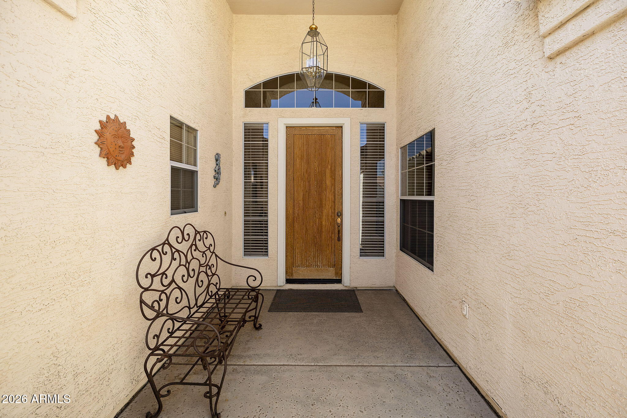 12435 West Monte Vista Road Avondale, AZ 85392 - Photo 8 of 69 a front view of a house with entryway