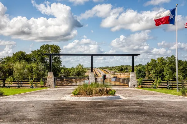 a view of a swimming pool with a yard