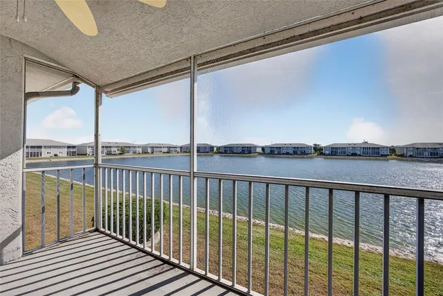 a view of a balcony with city