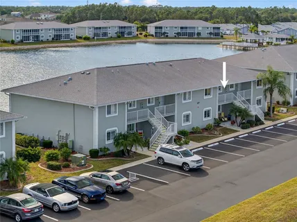 a view of a swimming pool and lounge chair
