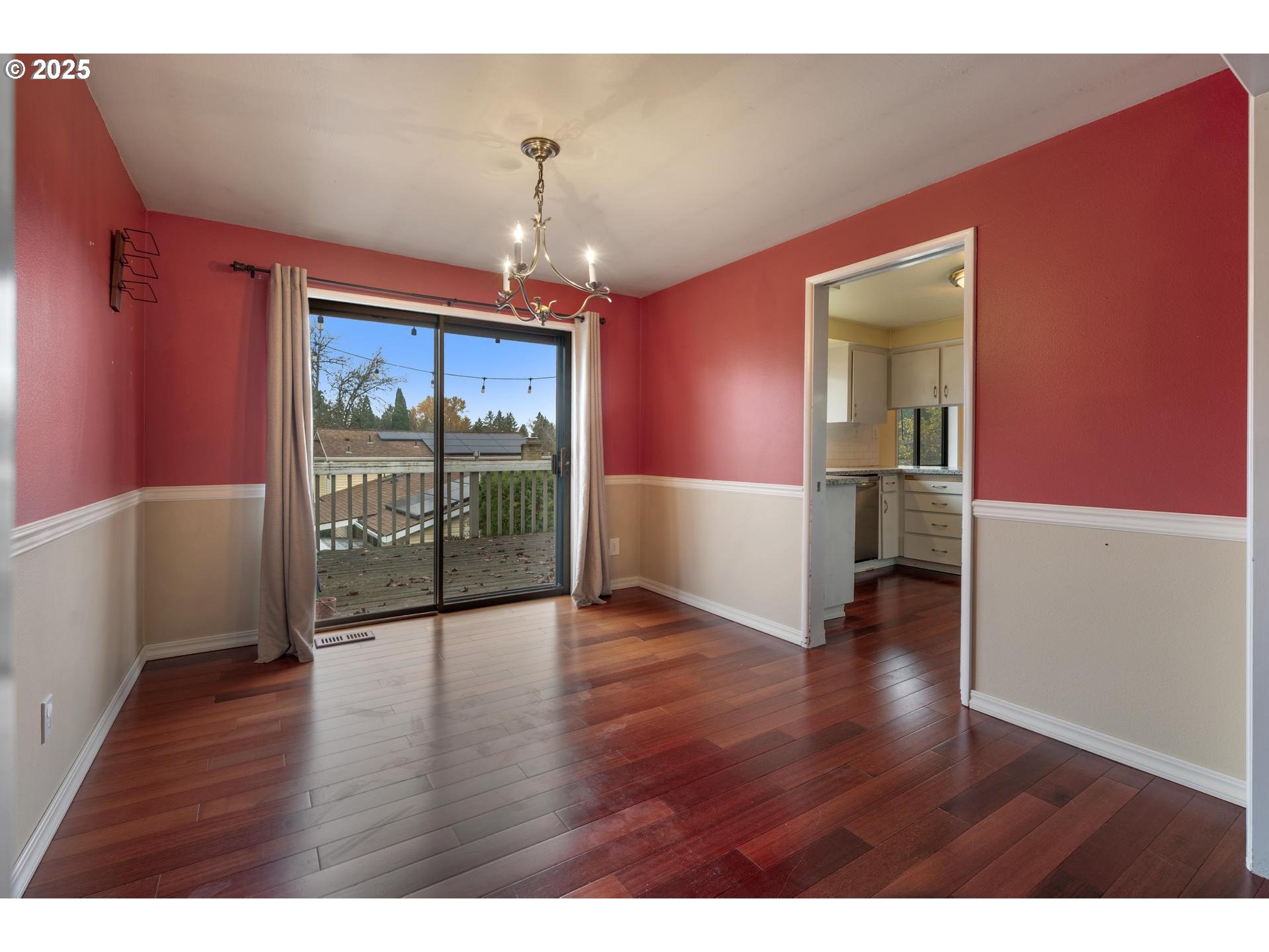 18115 Southwest Broad Oak Boulevard Beaverton, OR 97007 - Photo 11 of 43 a view of empty room with wooden floor