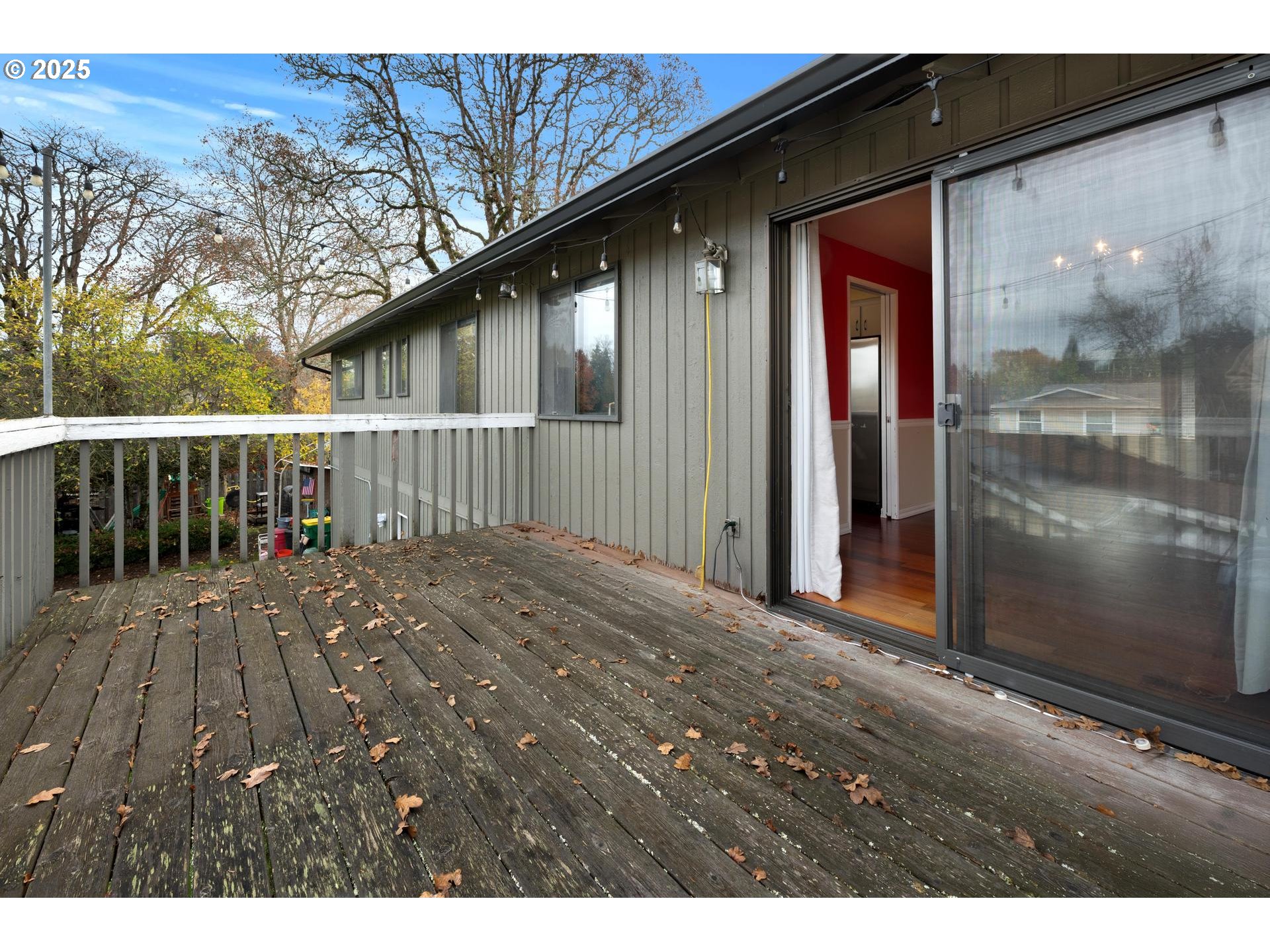 18115 Southwest Broad Oak Boulevard Beaverton, OR 97007 - Photo 12 of 43 a view of backyard with a deck and wooden floor