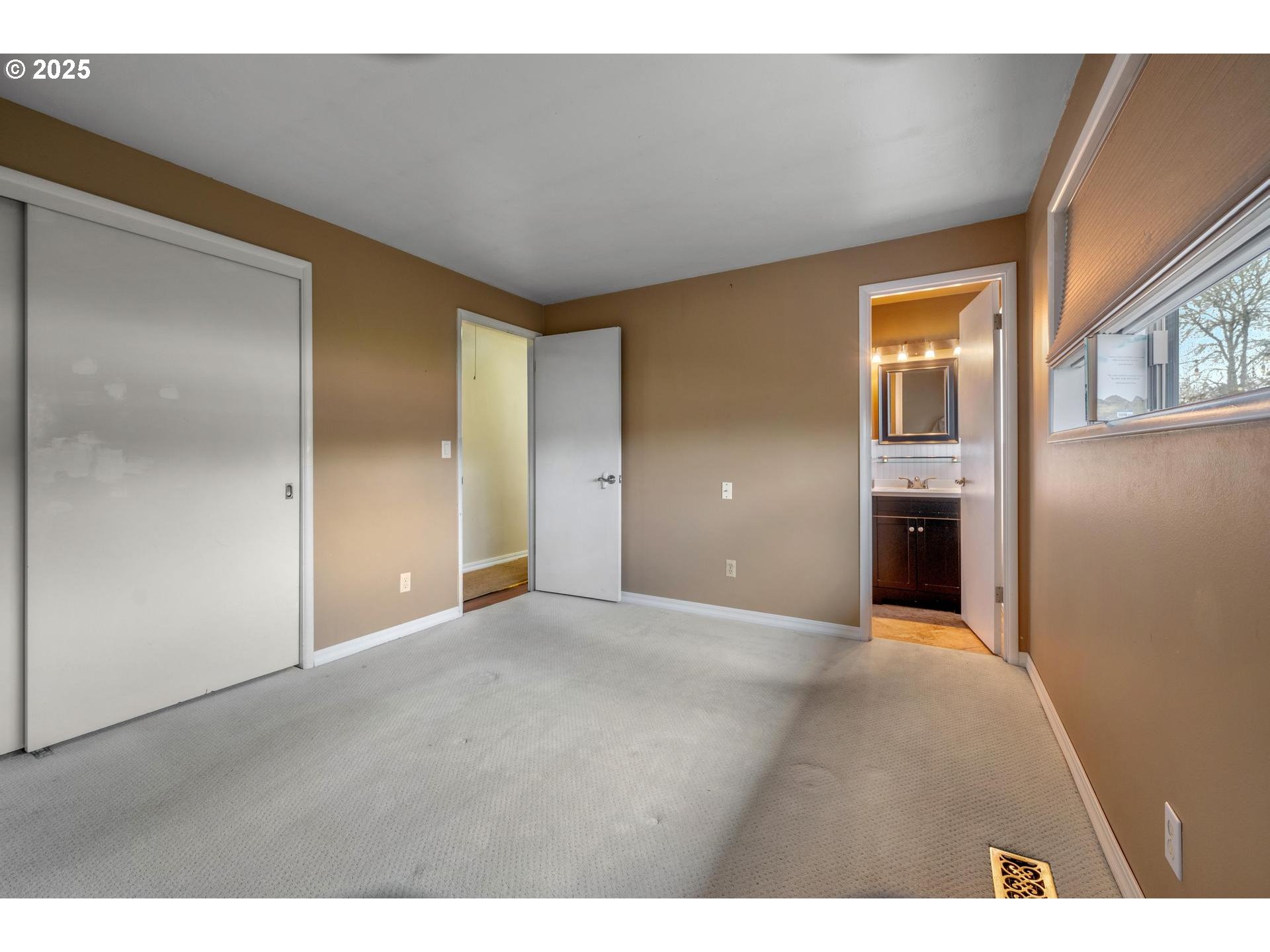 18115 Southwest Broad Oak Boulevard Beaverton, OR 97007 - Photo 20 of 43 a view of an empty room with a fireplace