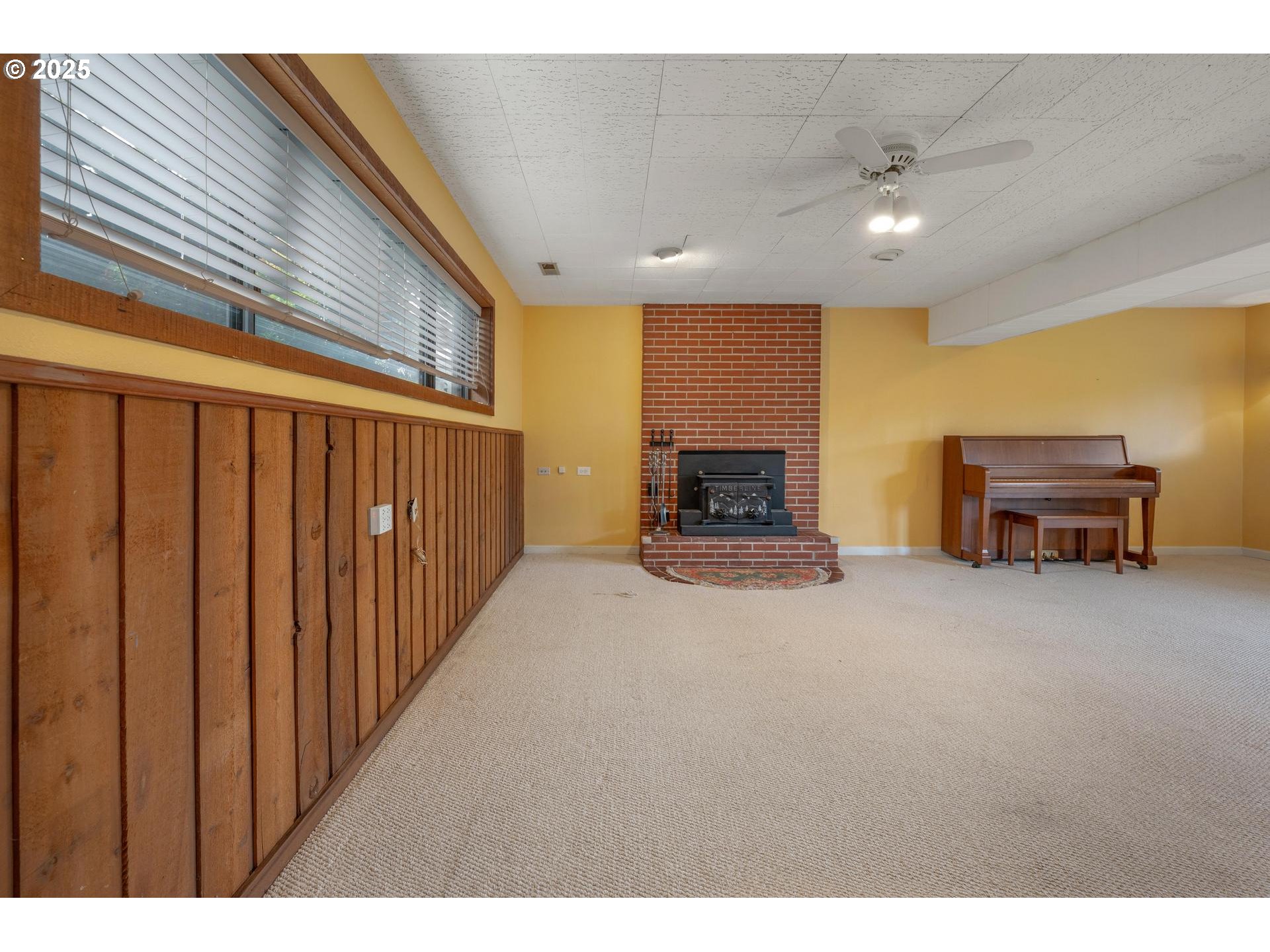 18115 Southwest Broad Oak Boulevard Beaverton, OR 97007 - Photo 28 of 43 a view of kitchen with furniture and a flat screen tv