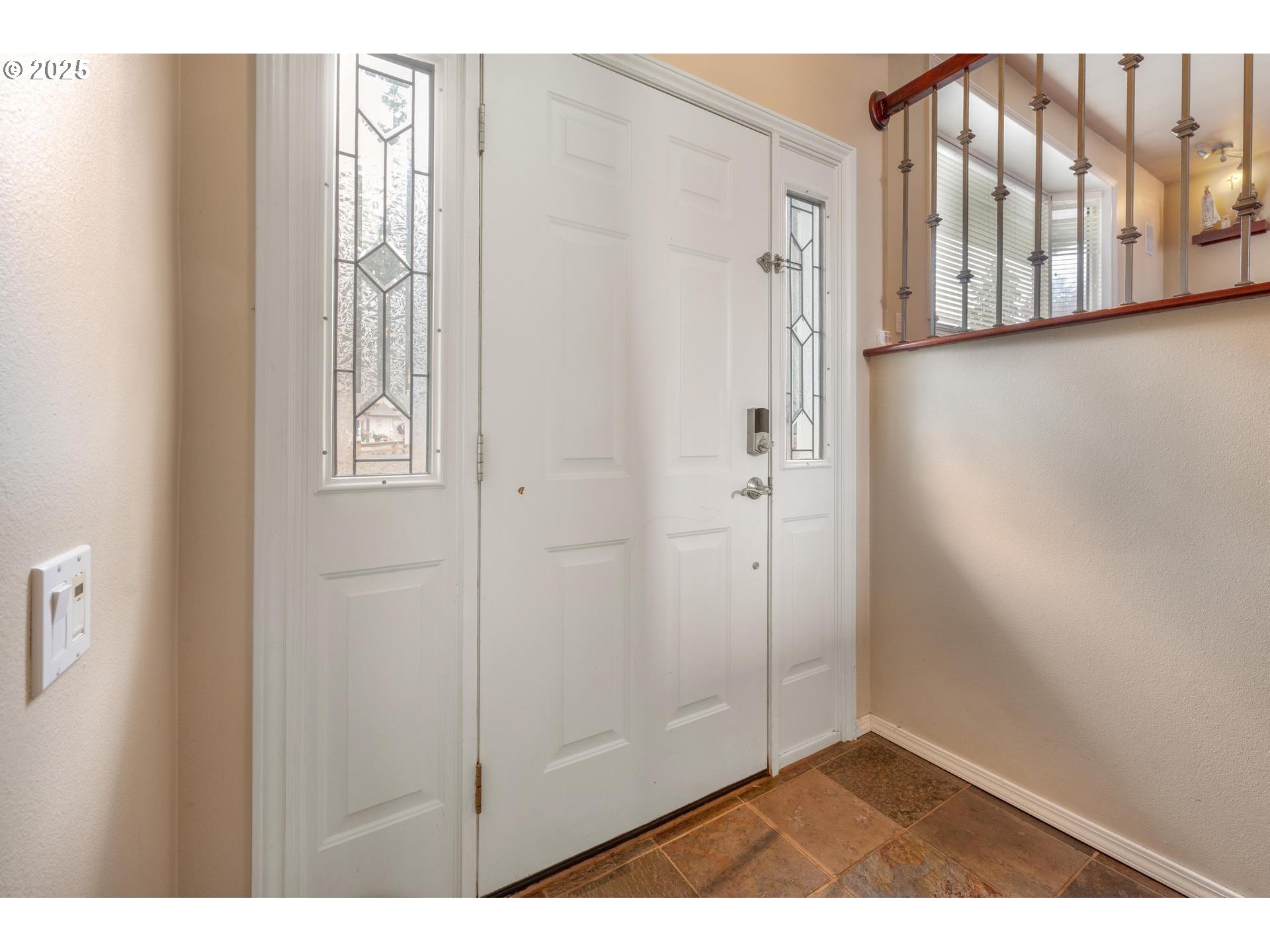 18115 Southwest Broad Oak Boulevard Beaverton, OR 97007 - Photo 4 of 43 a view of an entryway with wooden floor