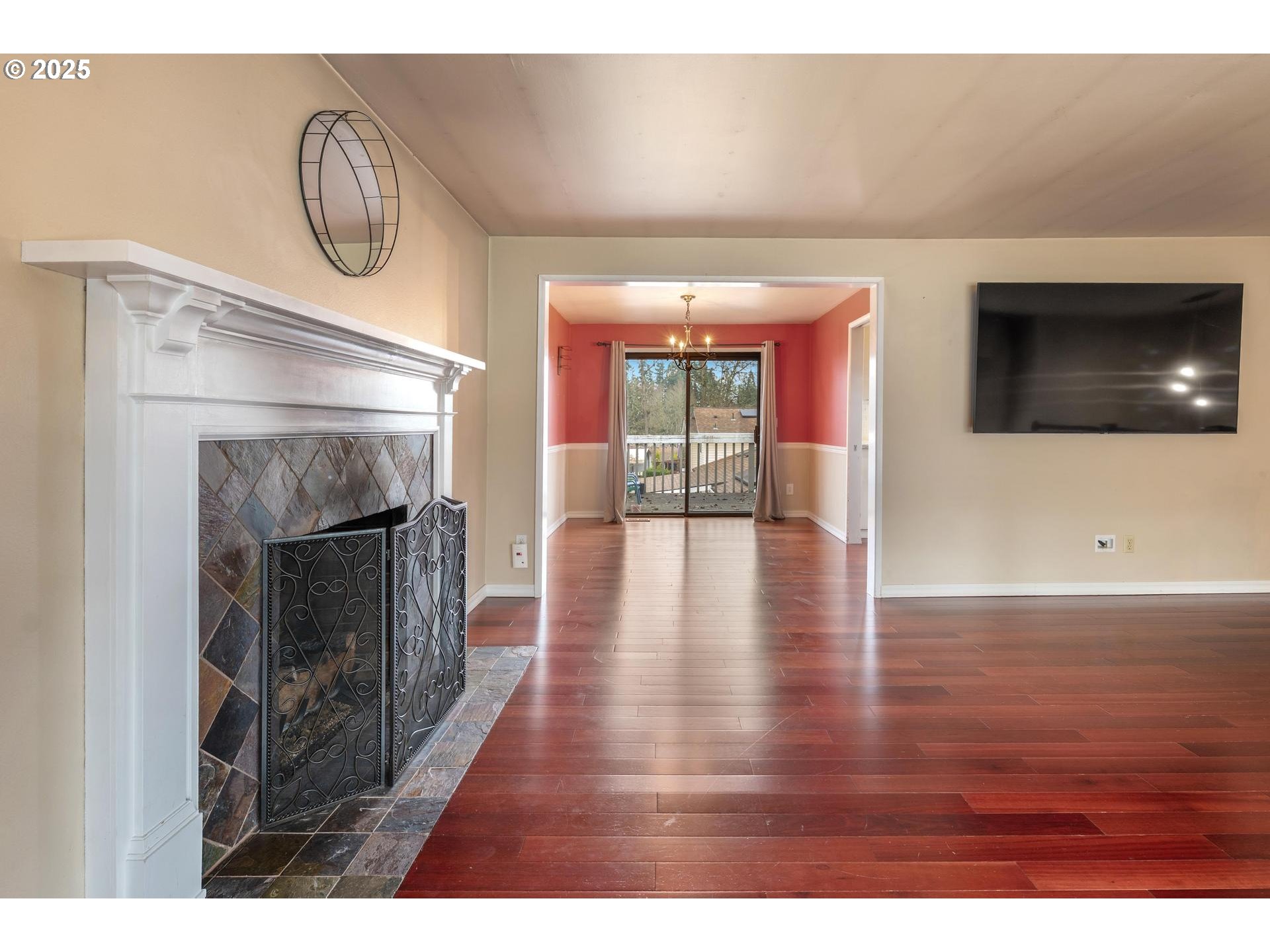18115 Southwest Broad Oak Boulevard Beaverton, OR 97007 - Photo 9 of 43 a view of empty room with wooden floor