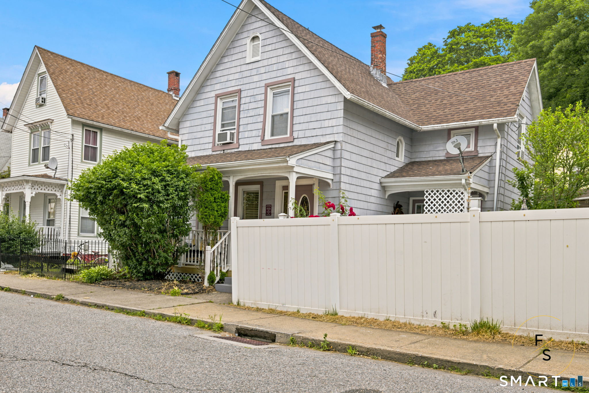 182 Broad Street Norwich, CT 06360 - Photo 2 of 30 a view of house with street