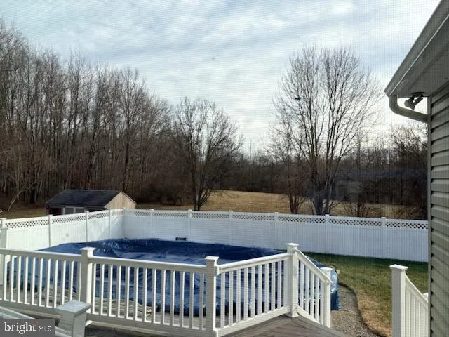 a view of a chairs and tables in the patio