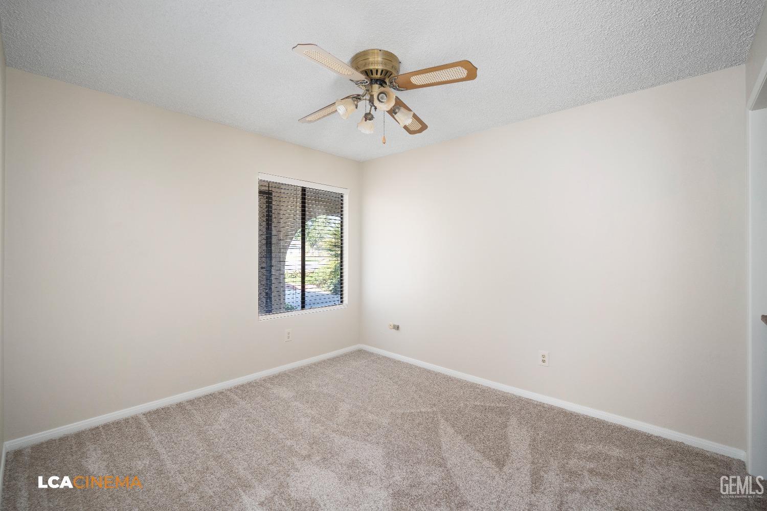 Undisclosed Address Bakersfield, CA 93309 - Photo 12 of 22 a view of a room with window and ceiling fan
