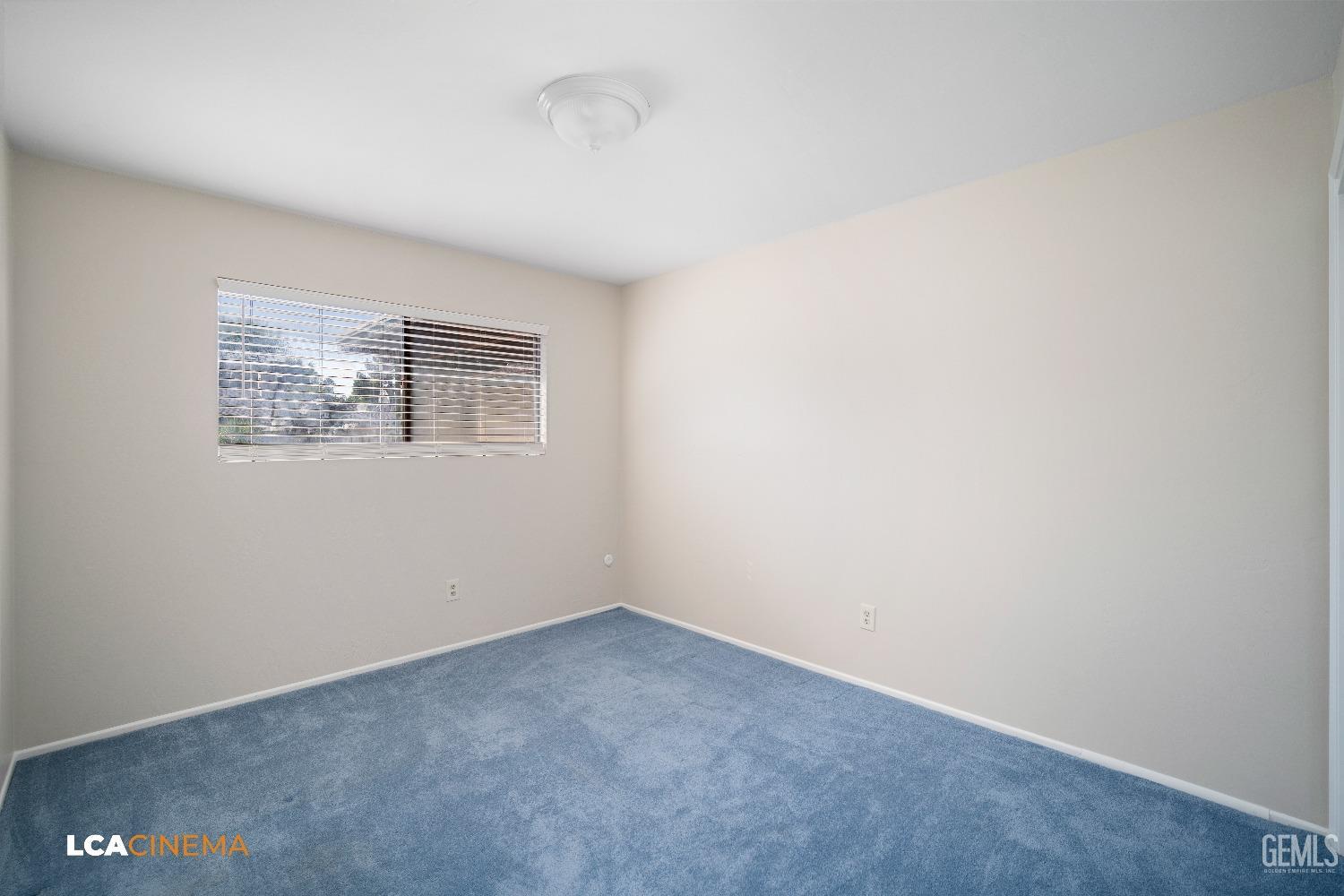 Undisclosed Address Bakersfield, CA 93309 - Photo 13 of 22 a view of an empty room with a window