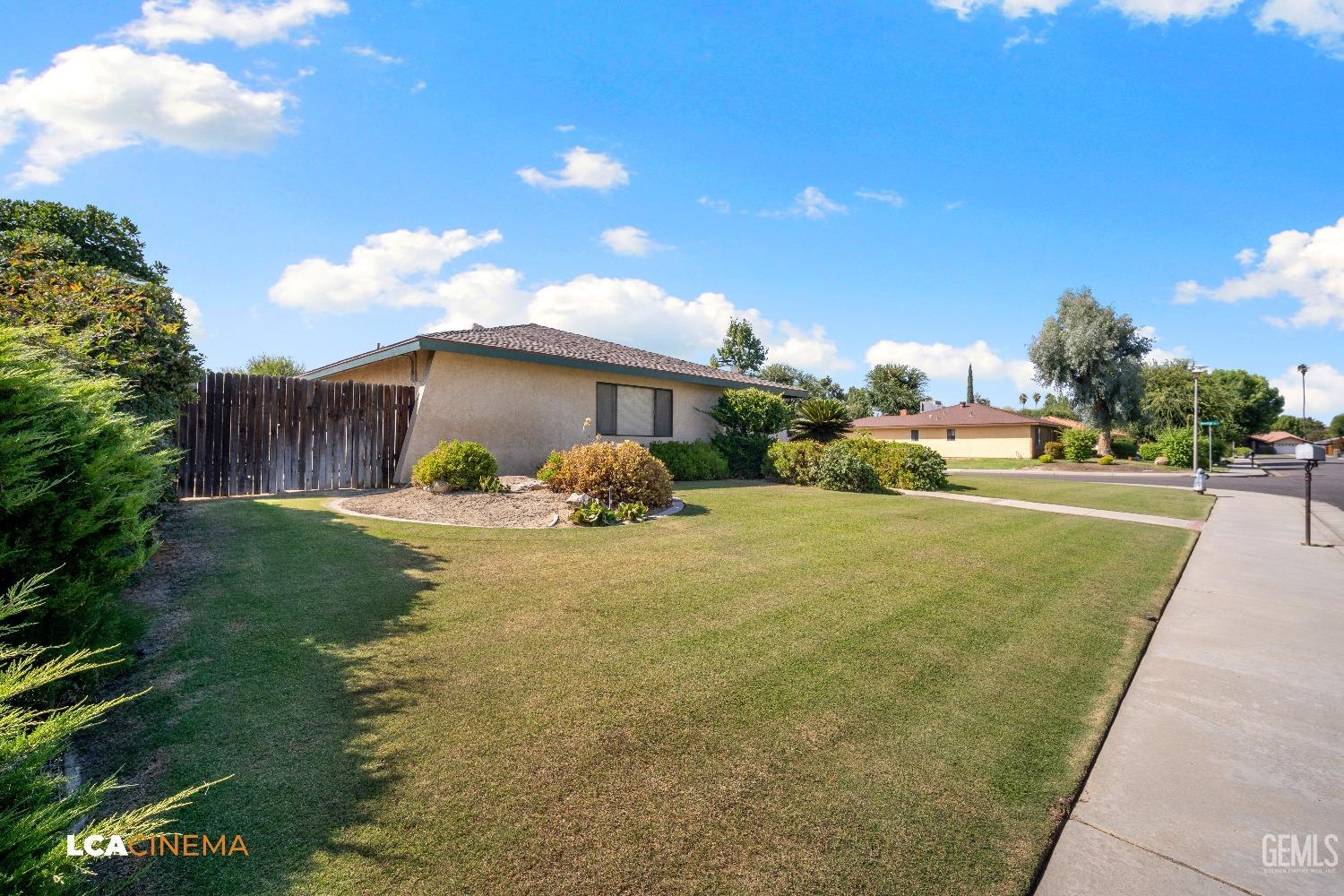 Undisclosed Address Bakersfield, CA 93309 - Photo 2 of 22 a house view with garden space