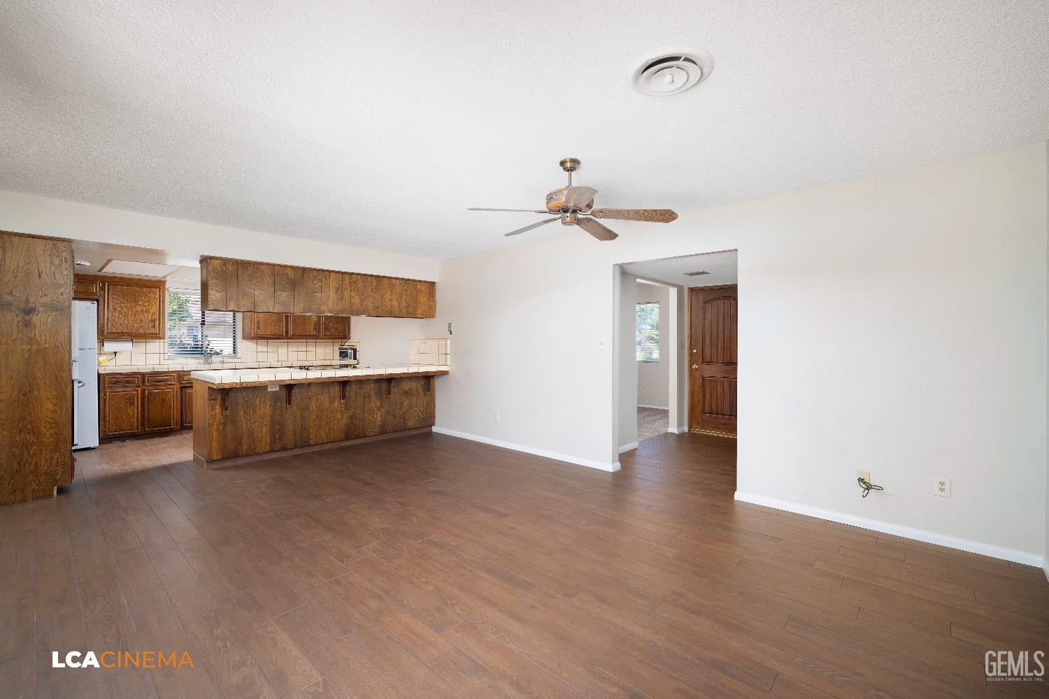 Undisclosed Address Bakersfield, CA 93309 - Photo 5 of 22 a view of a kitchen with a sink a cabinet and a window