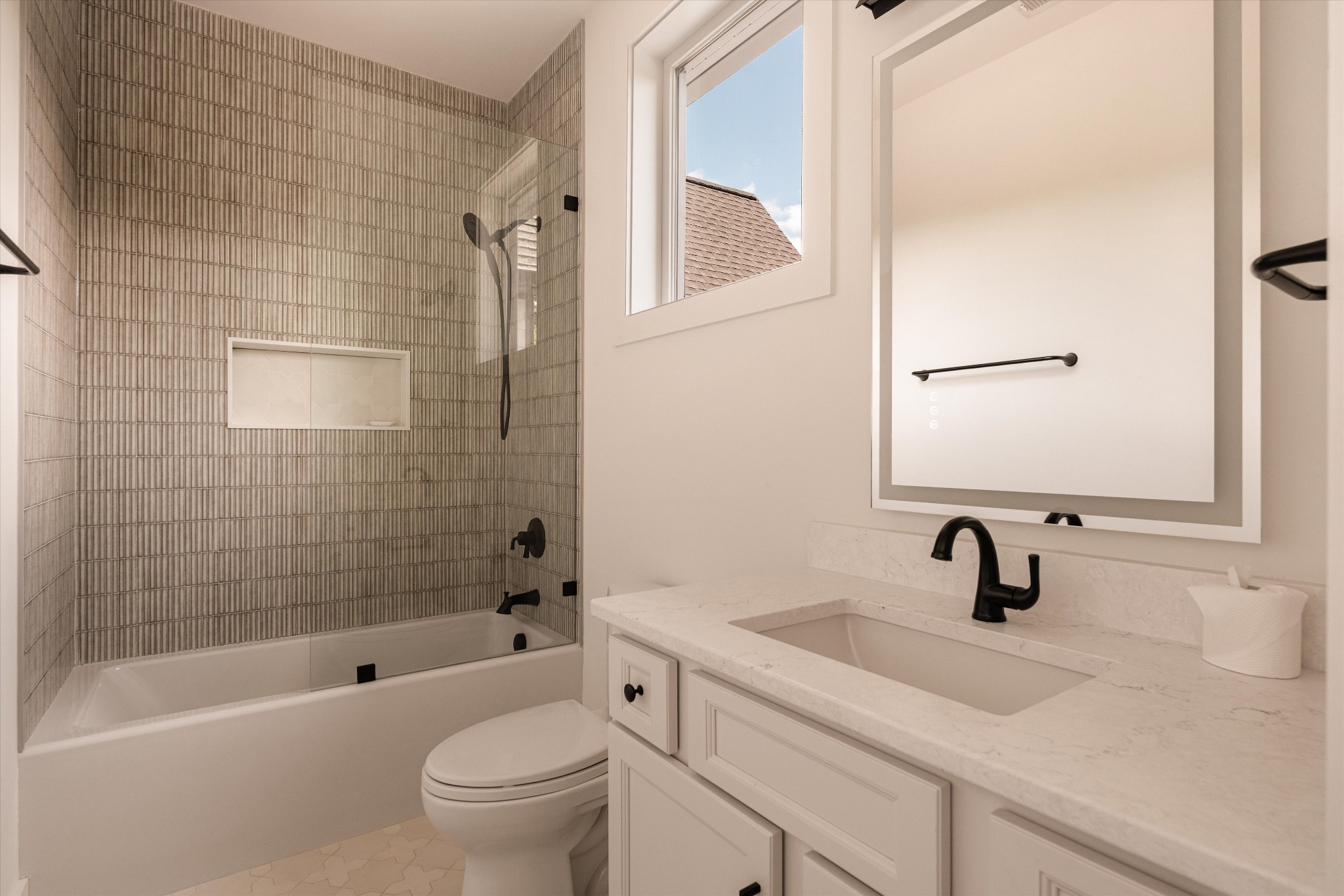6801 Flat Creek Road College Grove, TN 37046 - Photo 52 of 66 a bathroom with a sink a toilet and a bathtub