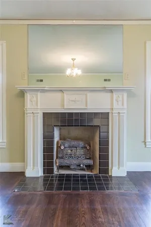 a room with fireplace and a fireplace