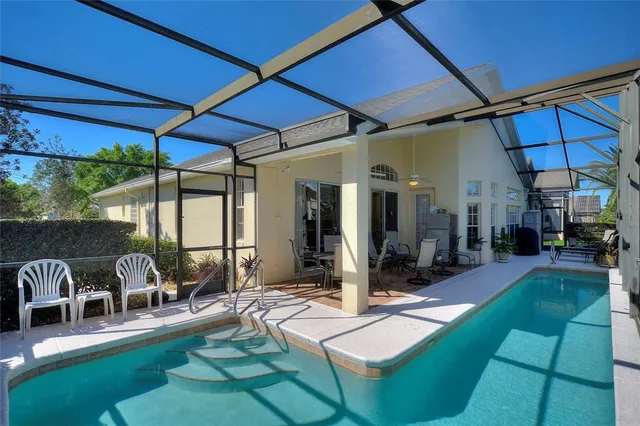 a view of a house with a flower garden