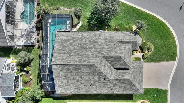 a building outdoor space with patio furniture and potted plants