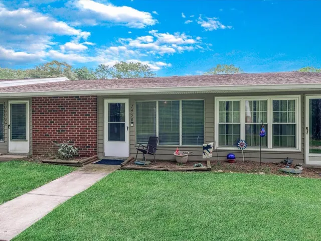 a house view with a garden space