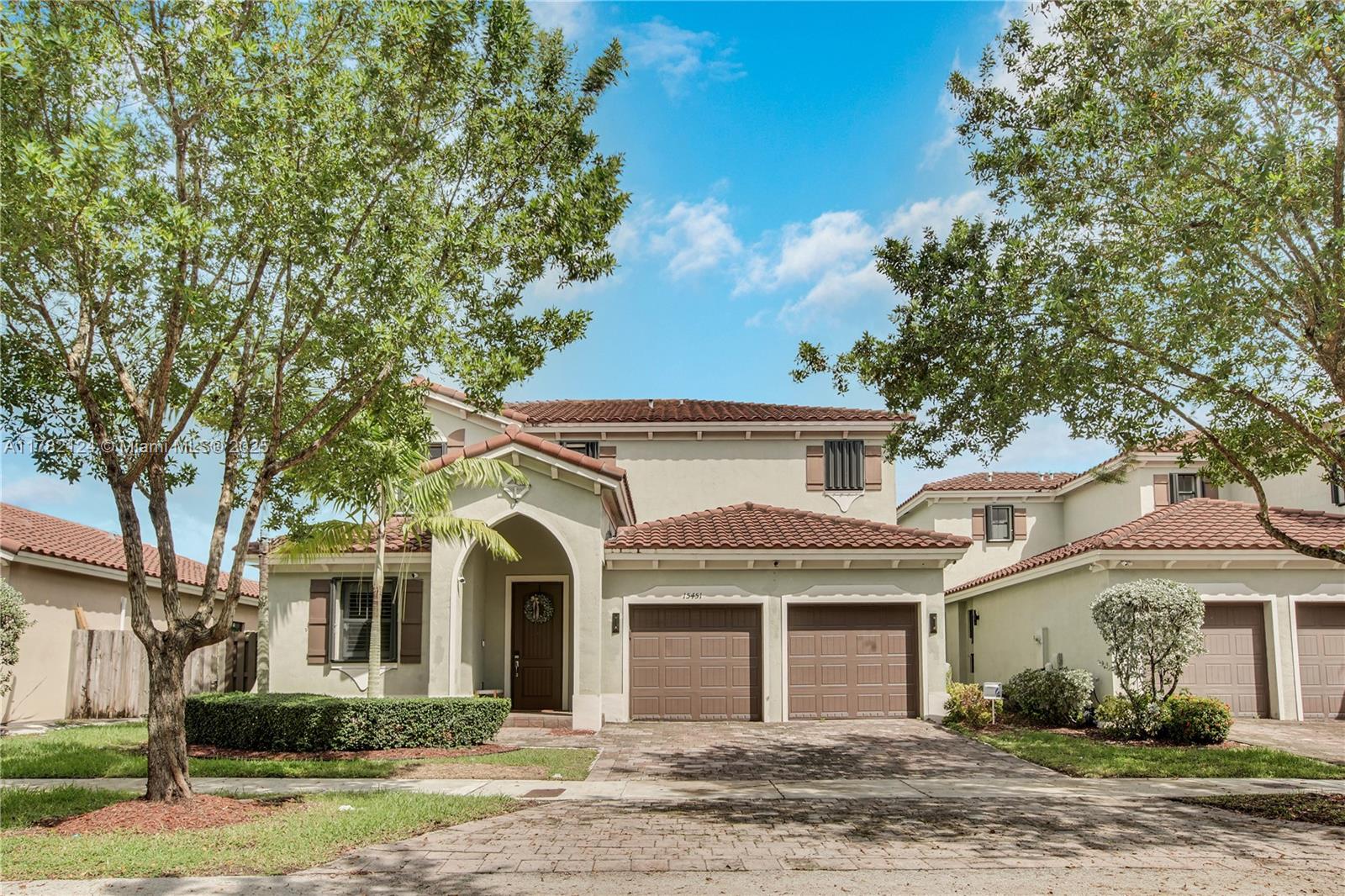 15451 Southwest 173rd Lane Miami, FL 33187 - Photo 1 of 17 front view of a house
