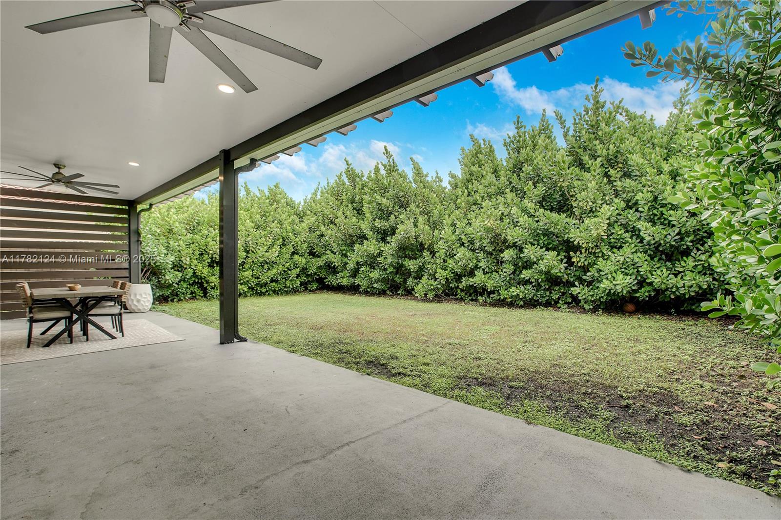 15451 Southwest 173rd Lane Miami, FL 33187 - Photo 14 of 17 a view of an outdoor space and porch