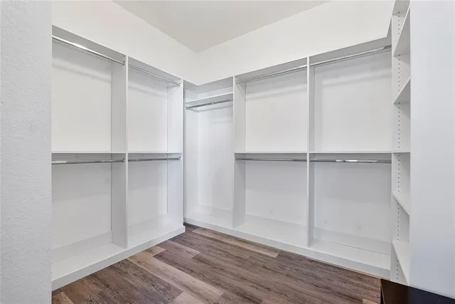 a view of an empty walk in closet