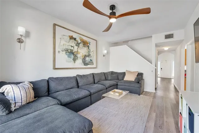 a living room with furniture and a couch