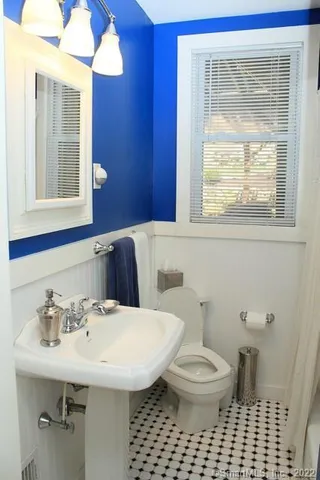 a view of an outdoor dining space with a table & chairs