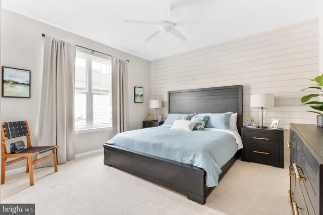 a bed room with a bed and a couch