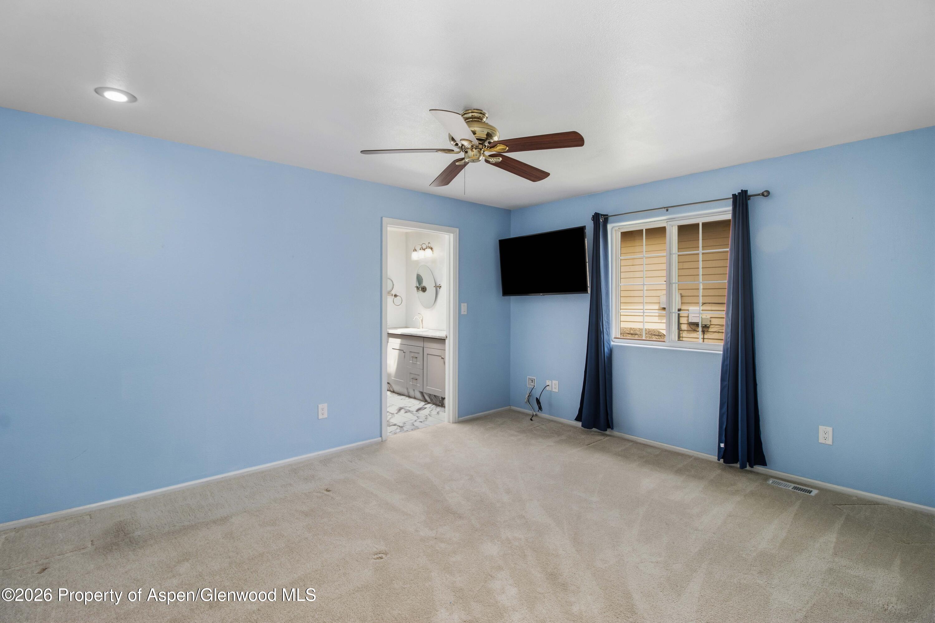 660 Aspen Avenue Rifle, CO 81650 - Photo 15 of 30 a view of empty room with window