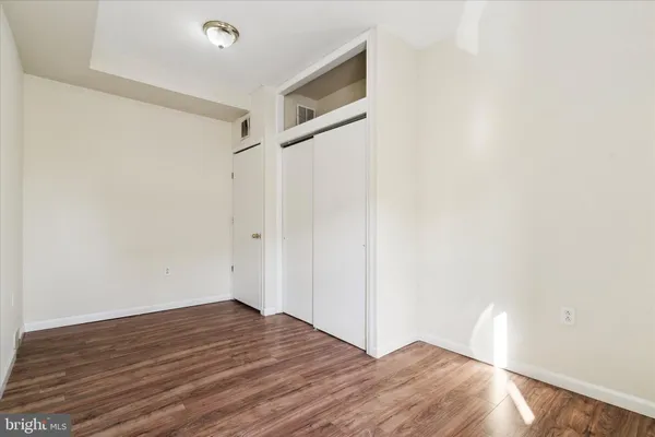 a kitchen with stainless steel appliances a refrigerator and a stove top oven