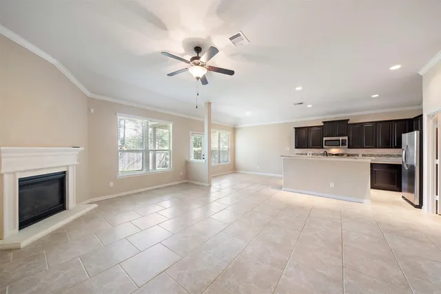 a view of a kitchen with a sink cabinets and outdoor space