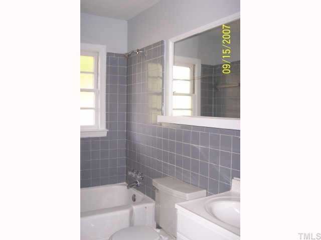 4305 James Road Raleigh, NC 27616 - Photo 3 of 5 a bathroom with a toilet a sink and bathtub