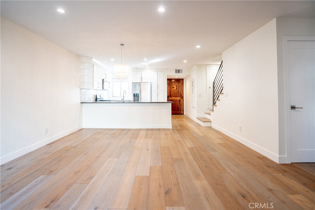 10926 Bluffside Drive, Unit 9 Studio City, CA 91604 - Photo 12 of 43 a view of a kitchen with wooden floor