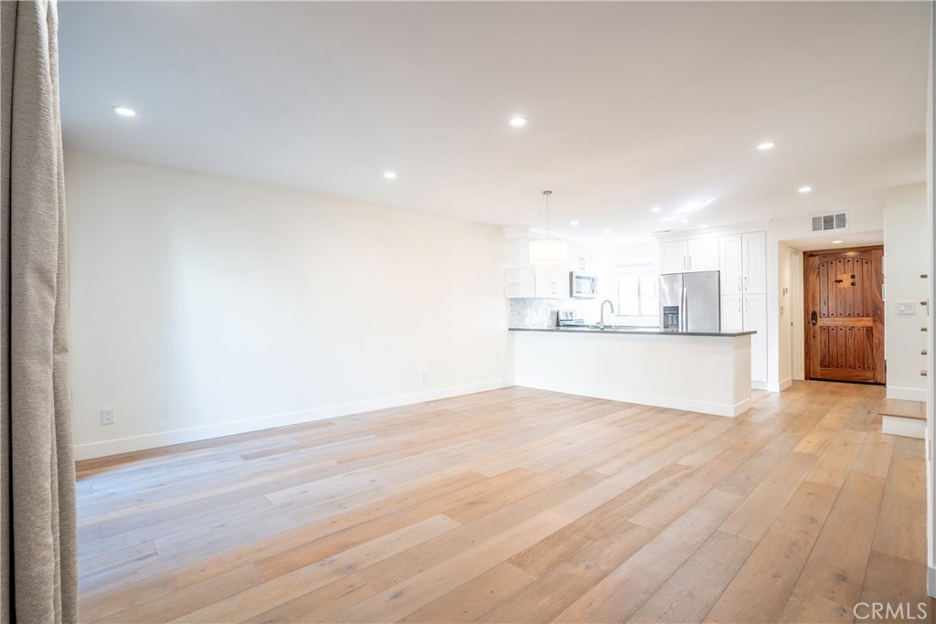 10926 Bluffside Drive, Unit 9 Studio City, CA 91604 - Photo 13 of 43 a view of kitchen with wooden floor