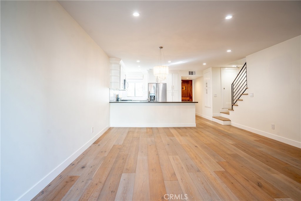 10926 Bluffside Drive, Unit 9 Studio City, CA 91604 - Photo 14 of 43 a view of a kitchen with wooden floor and a sink