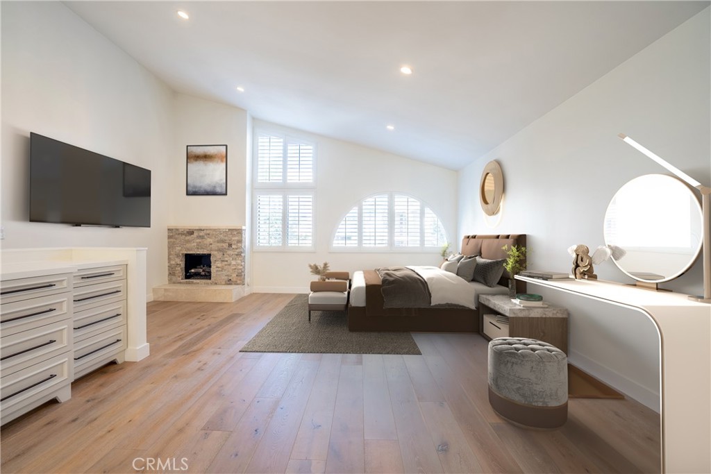 10926 Bluffside Drive, Unit 9 Studio City, CA 91604 - Photo 17 of 43 a living room with furniture a flat screen tv and a fireplace