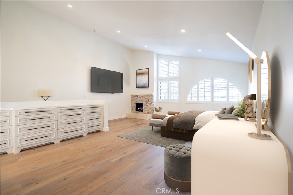 10926 Bluffside Drive, Unit 9 Studio City, CA 91604 - Photo 18 of 43 a bedroom with furniture and a flat screen tv