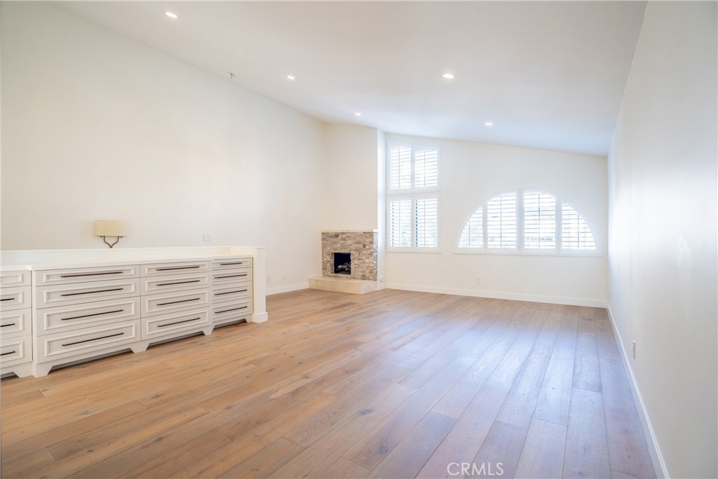 10926 Bluffside Drive, Unit 9 Studio City, CA 91604 - Photo 19 of 43 an empty room with windows and cabinet