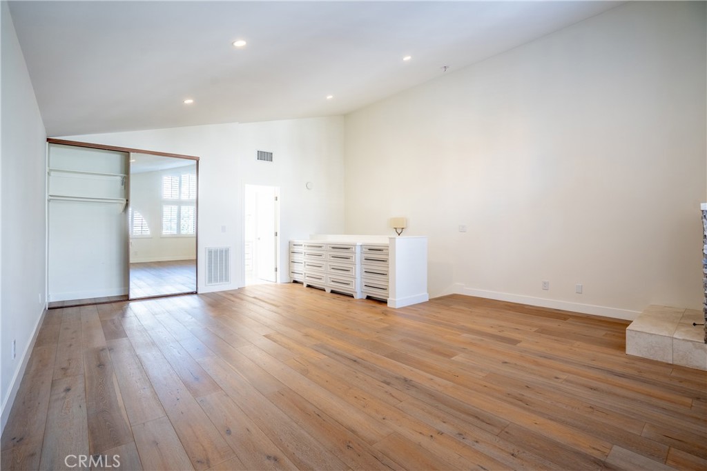 10926 Bluffside Drive, Unit 9 Studio City, CA 91604 - Photo 20 of 43 a view of an empty room with wooden floor and closet