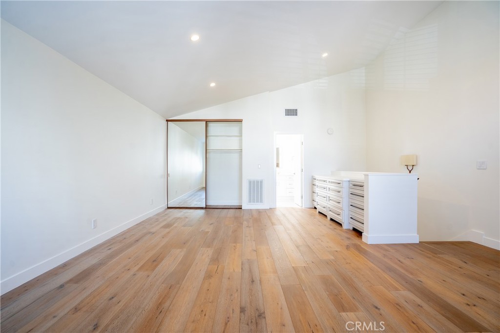 10926 Bluffside Drive, Unit 9 Studio City, CA 91604 - Photo 23 of 43 a view of an empty room with wooden floor