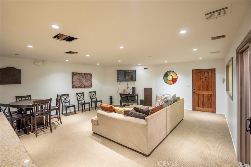 10926 Bluffside Drive, Unit 9 Studio City, CA 91604 - Photo 36 of 43 a living room with furniture and a window