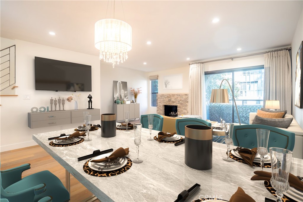 10926 Bluffside Drive, Unit 9 Studio City, CA 91604 - Photo 5 of 43 a kitchen with a stove and a view of living room