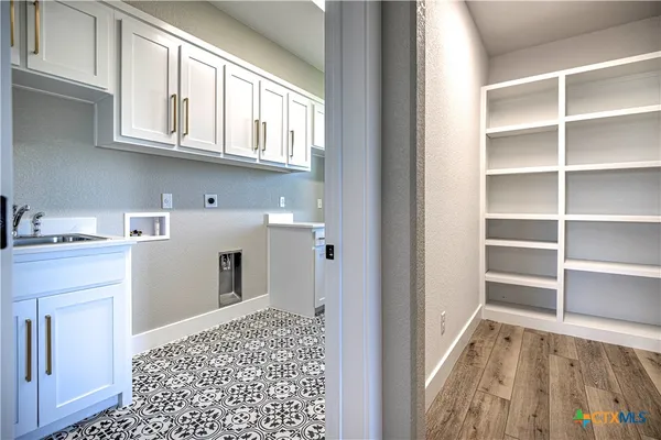 a view of kitchen and utility room